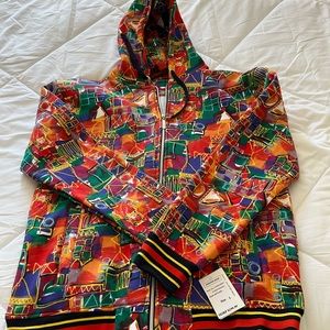 Johnnie Redd multi color zip up hoodie.